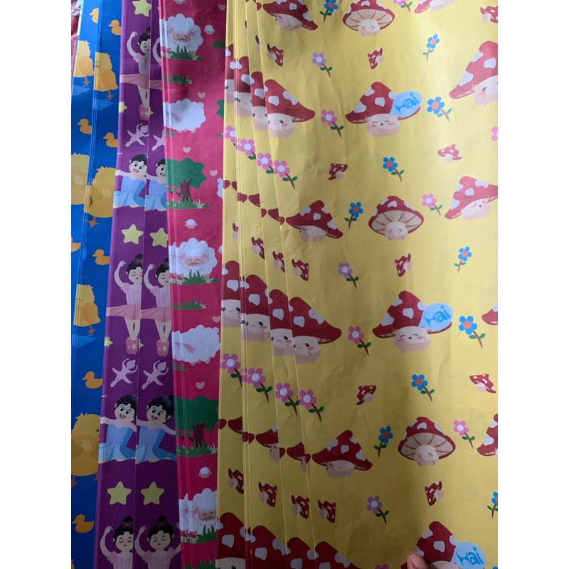 

Kertas Kado motif anak lucu