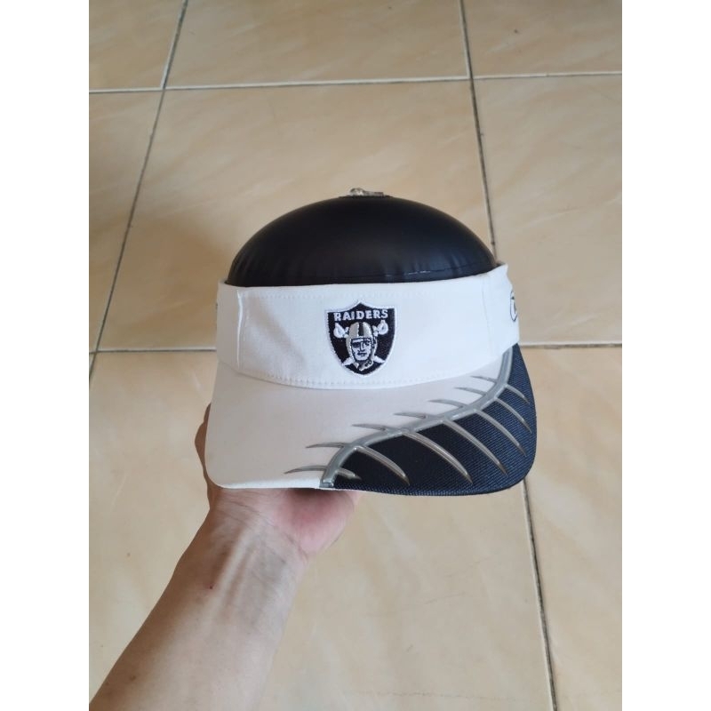 topi raiders second original