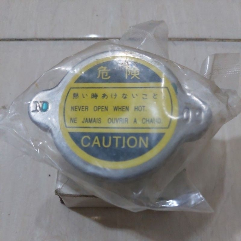 Tutup Radiator Isuzu Panther 2.3