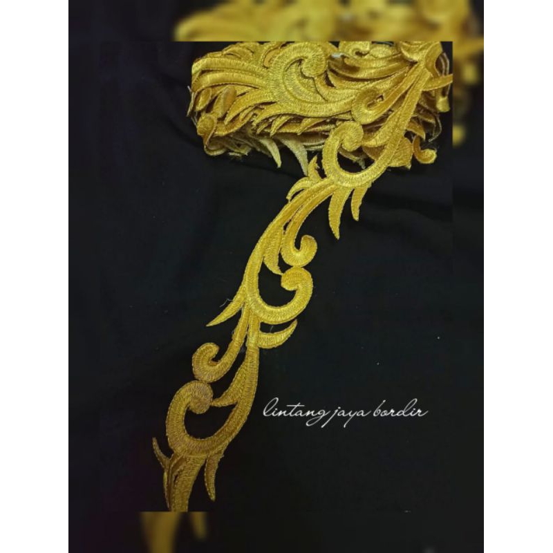 bordir meteran motif dayak