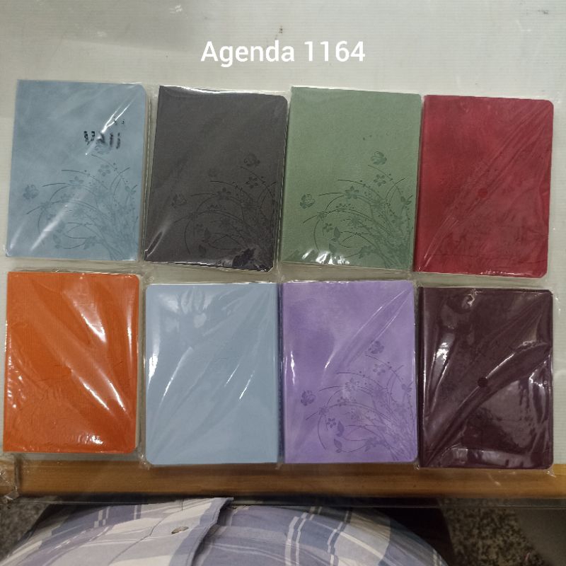 

NOTEPAD/AGENDA 1164