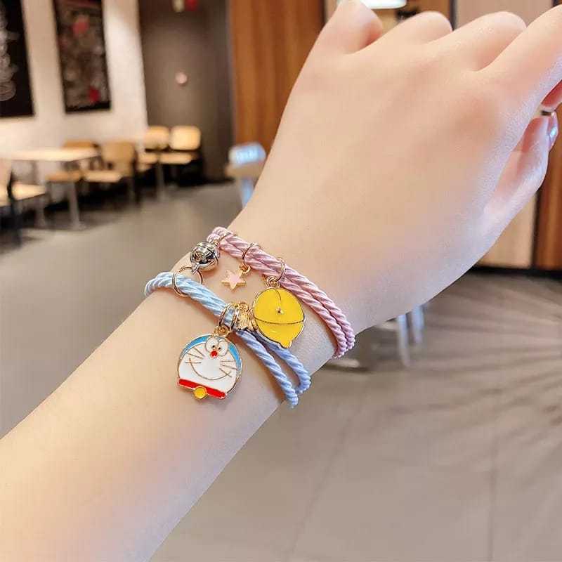 FANSTORE_PKU - COD / Harga 2 Pcs / Doraemon Magnet / Gelang Ikat Rambut Couple / 1 Pasang / Persahab