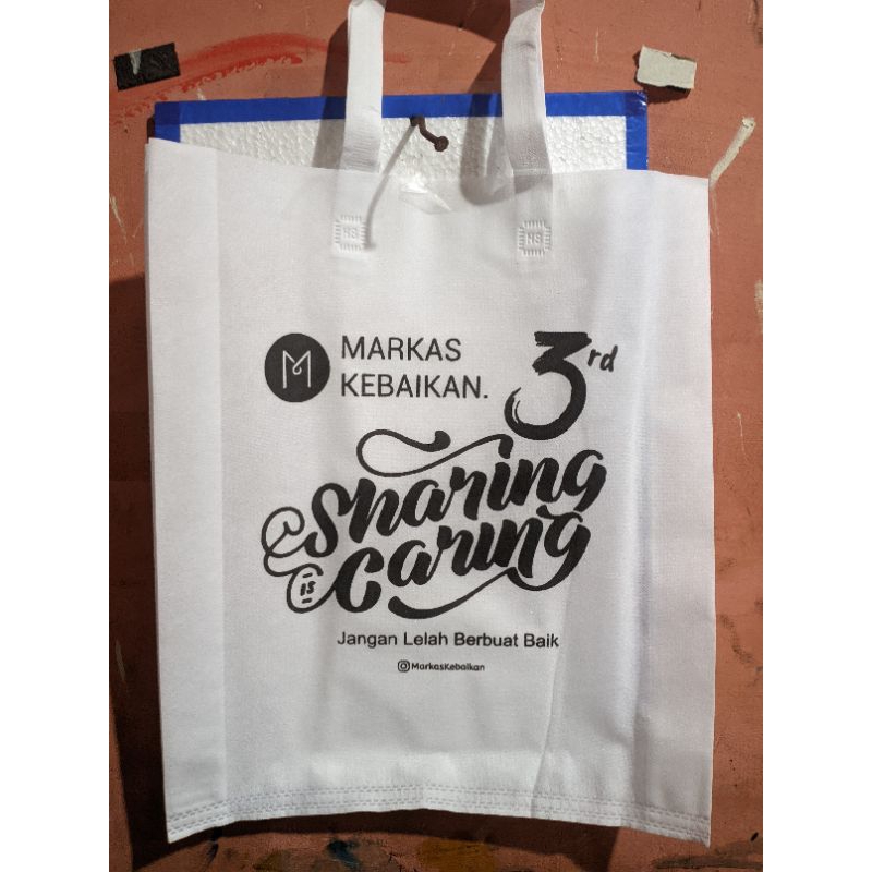 TAS SPUNBOND UKURAN 38*45*12 LIPATAN SAMPING + FREE SABLON 1 HARI BERES