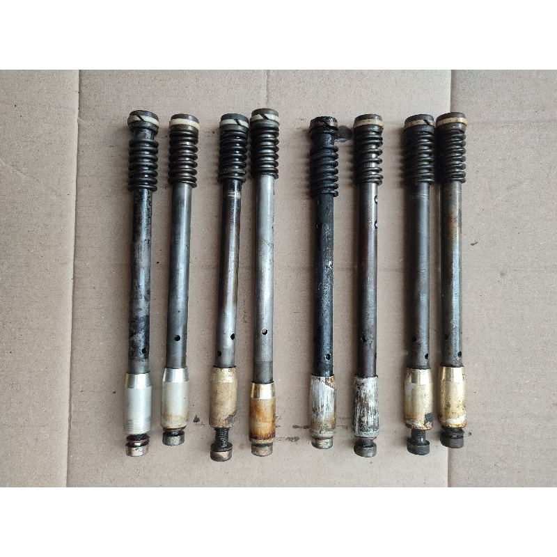 sulingan shok depan honda win original