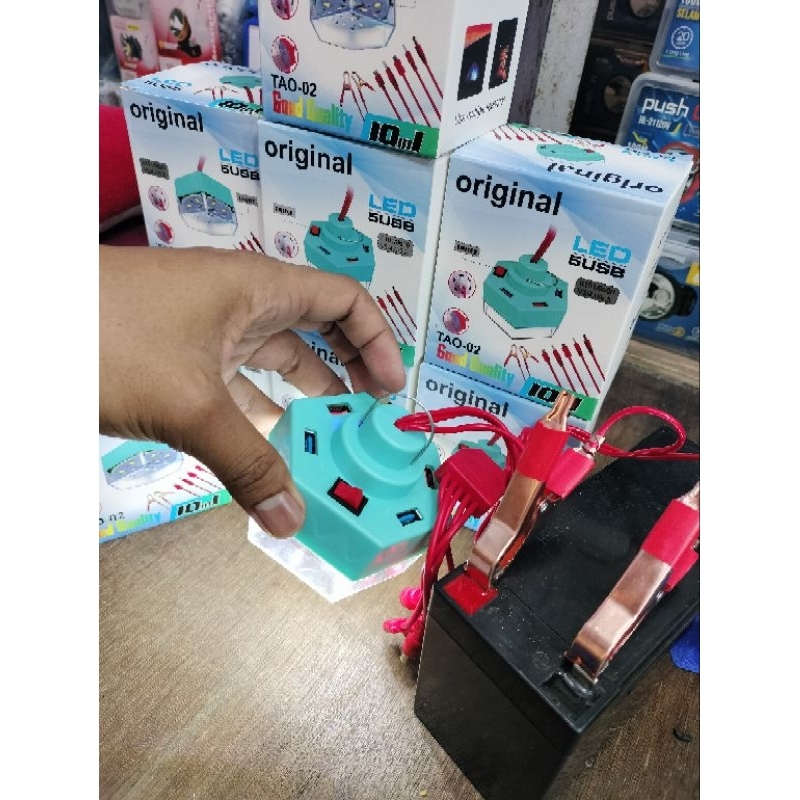 Charger DC hp  DC aki 12v-24v 5 USB + bohlam emergency