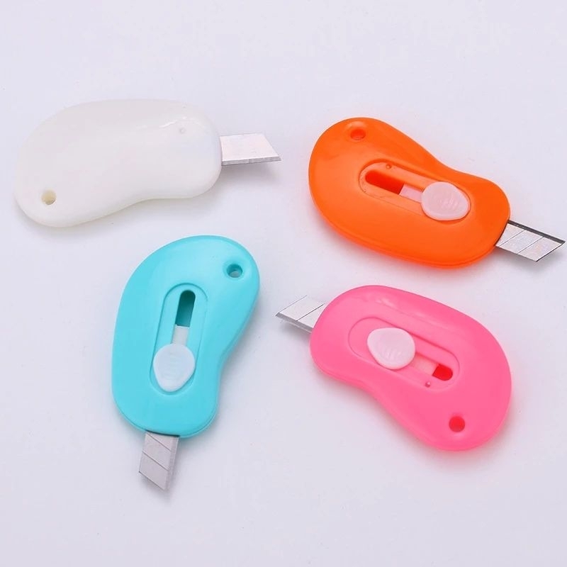 

Cutter Mini Portable Bentuk Oval Mini Cutter Polos Travel Kit Pemotong Kertas Pap