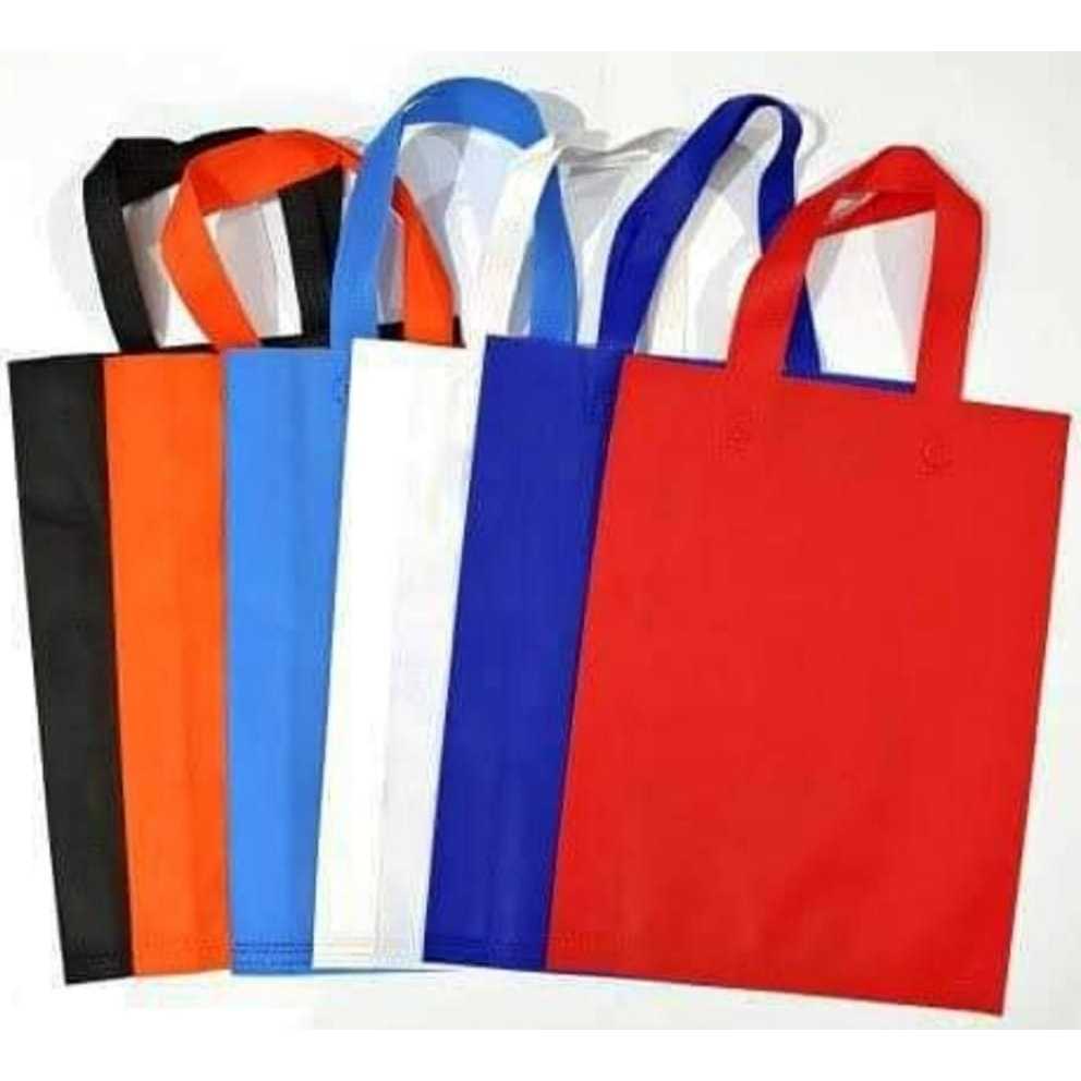 

Tas spunbond polos 25 x 35 x 8 tote bag handle press tebal 75 gsm