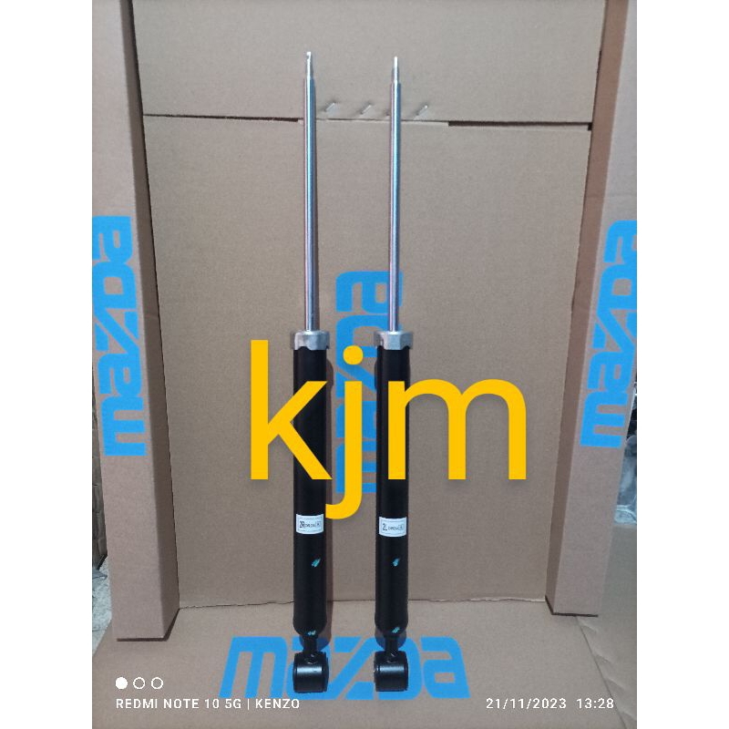 shockbreaker mazda 2 belakang original fomoco