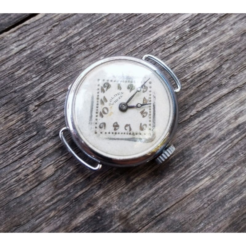 golden wheel lighter x cyma trench watch