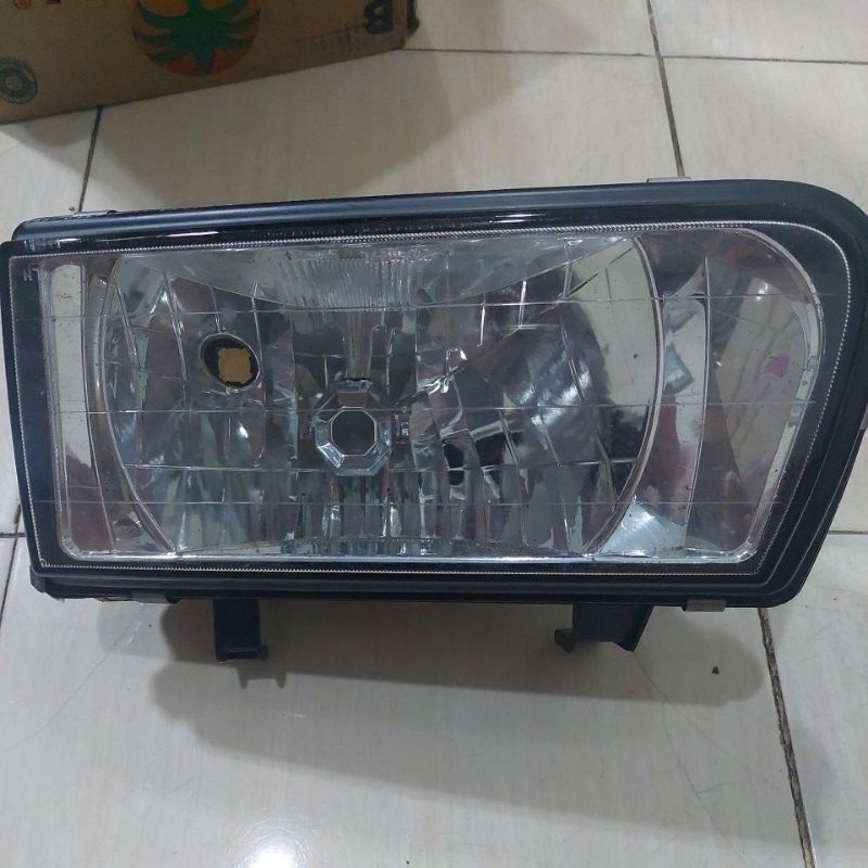 Lampu depan isuzu panther kapsul