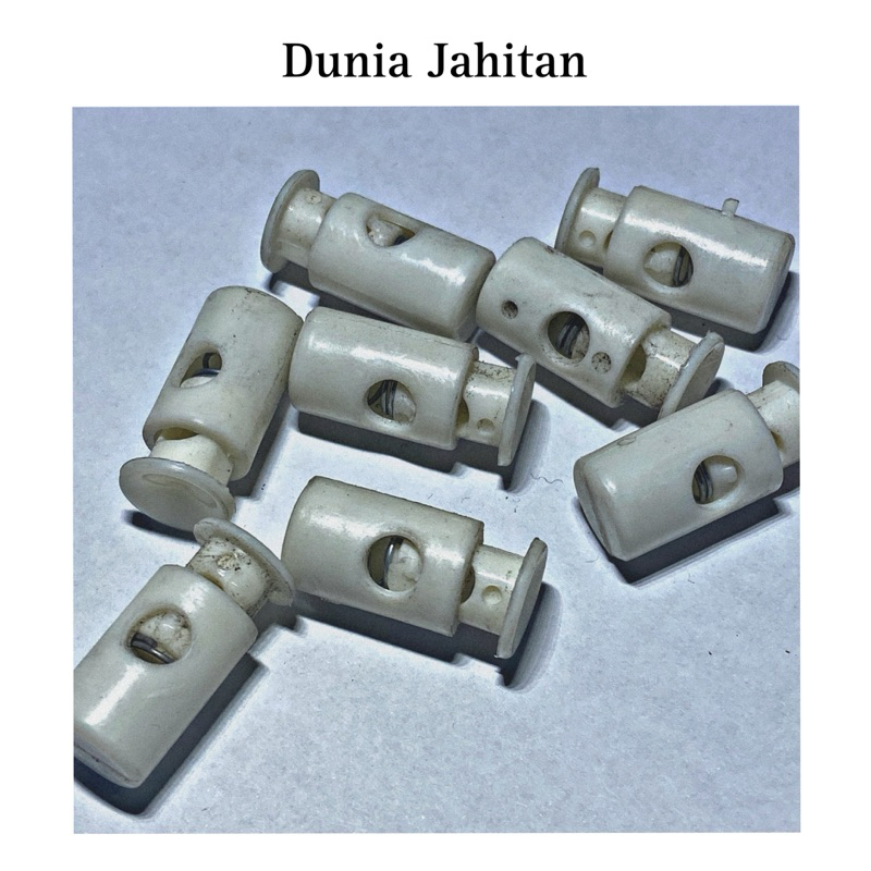 STOPPER UJUNG TALI BULAT PUTIH KUNING /PCS