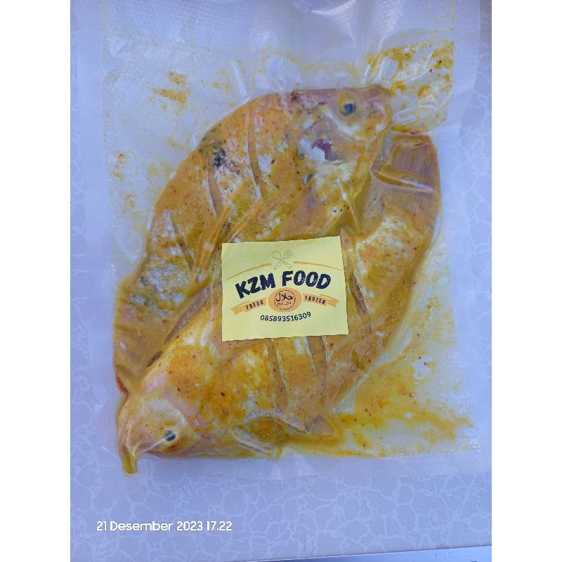

Ikan Nila Segar Bumbu Kuning isi 2 ekor Plus Sambal HALAL