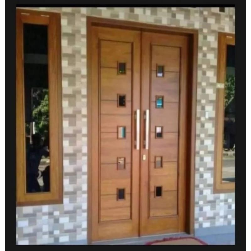 Daun pintu kupu tatung