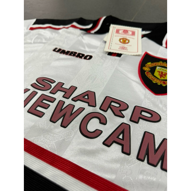 IK3 RETRO JERSEY RETRO MU AWAY LOGO PERISAI 1998/1999 GRADE ORI