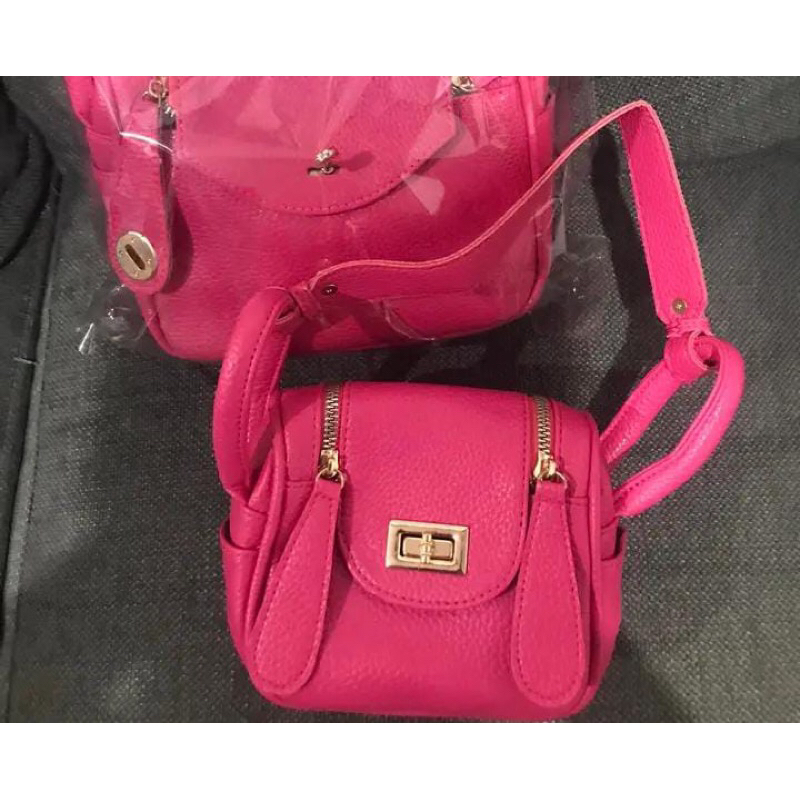 tas lindi fusia hitam