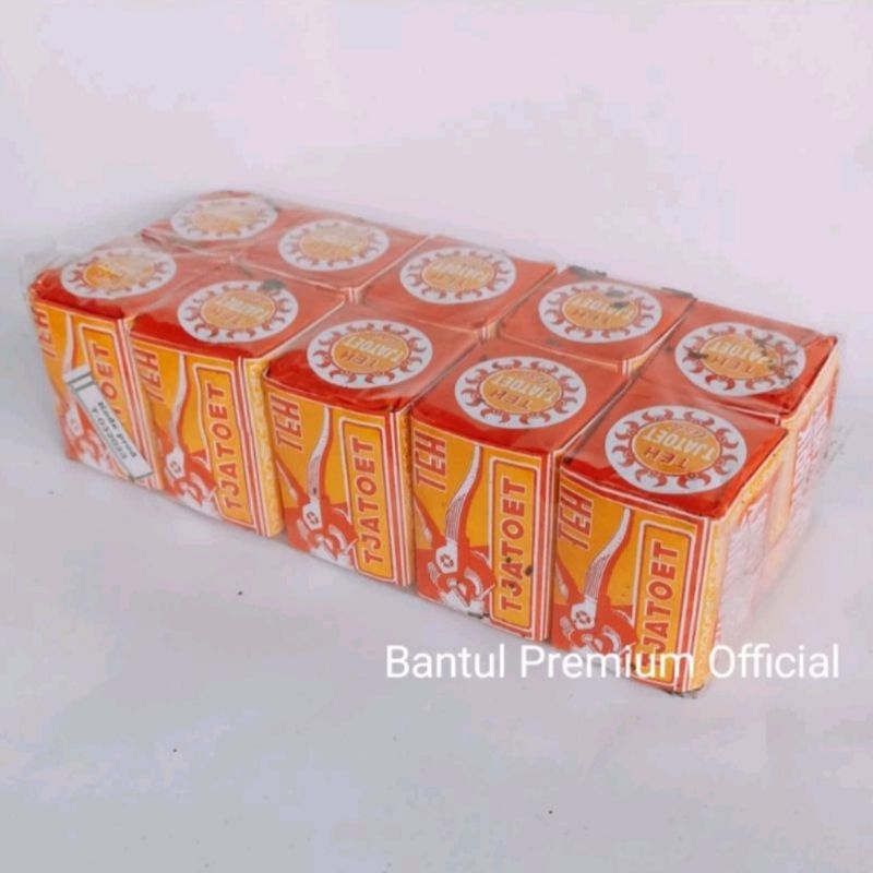 

Teh Tjatoet Kuning 40 gram 1 slop /pack isi 10 bungkus