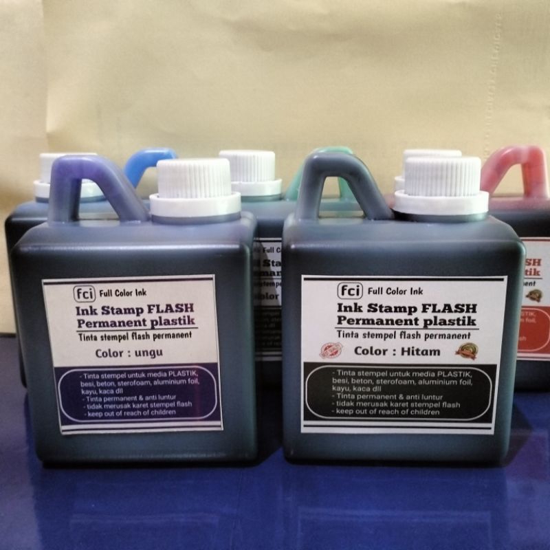 

TINTA STEMPEL FLASH PERMANENT UNTUK PLASTIK DLL ISI 500 ML