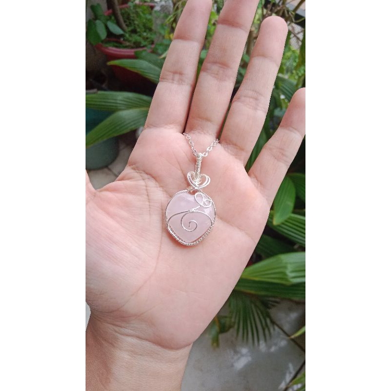 wire wrap necklace with crystal rose quartz in silver wire