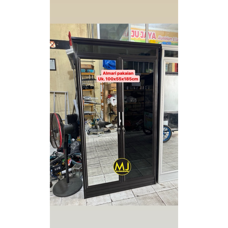 Almari pakaian / almari baju aluminium kaca khusus kediri