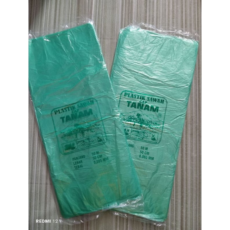 plastik meteran warna hijau cap tanam/ plastik balon/ plastik lampion