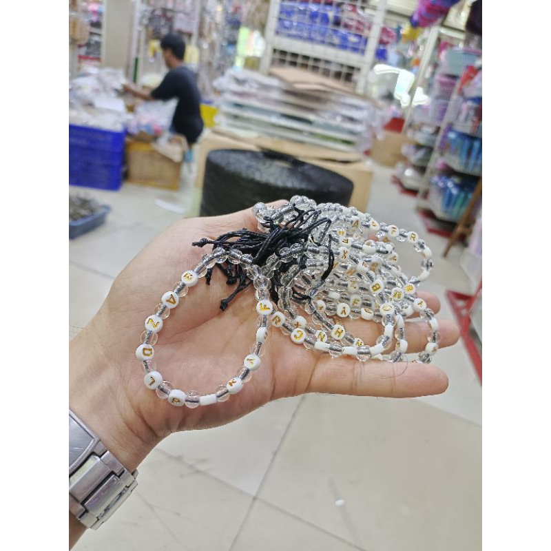 Gelang Manik Mute Huruf Gold Terbaru isi12pcs(1lusin)