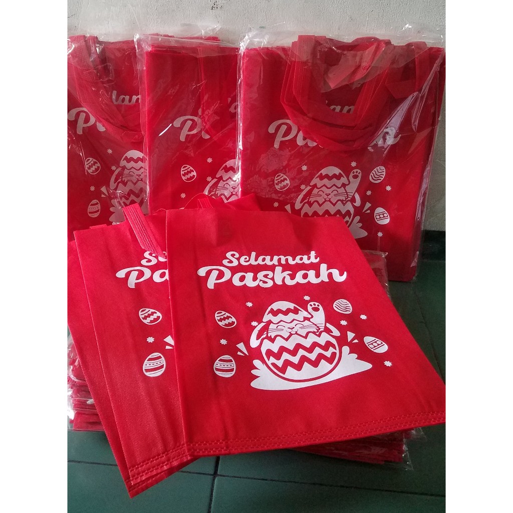 

EDISI PASKAH GOODIE BAG / TAS SPUNBOND SABLON 1 WARNA CUSTOM DESAIN