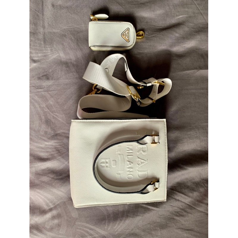 Tas Prada saffiano sling bag lampo