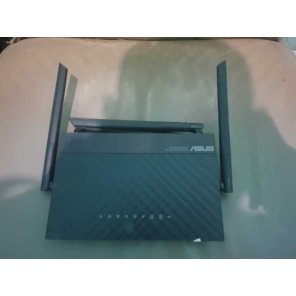 ASUS RT-AC59U Dual Band Gigabit  dan Asus RT-N12HP