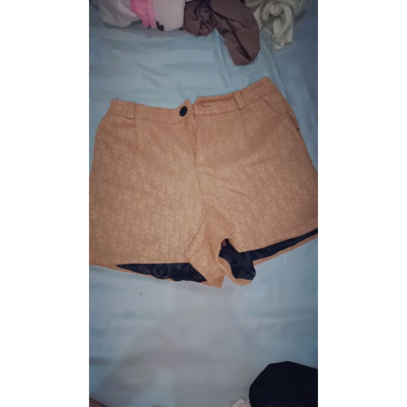 Celana pendek Dior