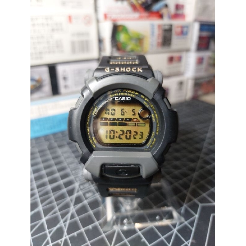 g shock dw 002 black gold