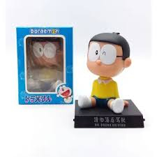 pajangan mobil kepala goyang karakter boneka Nobita