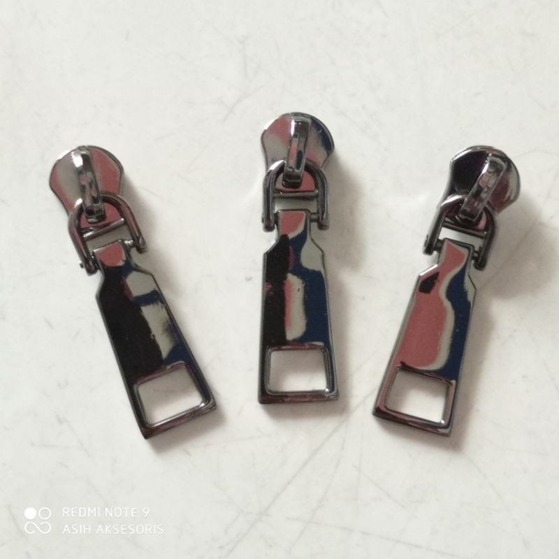 Kepala resleting no.5 untuk rell gigi besi Black nikel @1lusin/12pcs