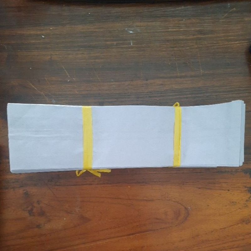 

Kertas roti, kertas packing benih, 19x25 Biasa (1 ikat 100pcs)