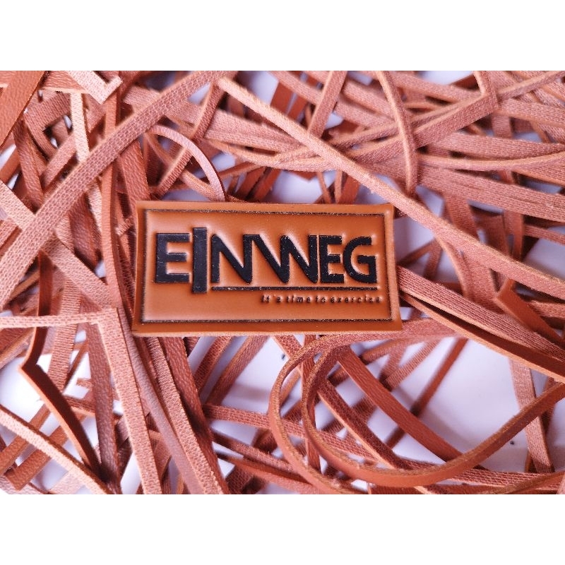 

label kulit imitasi label baju label celana leather pack label tas label hijab label embos