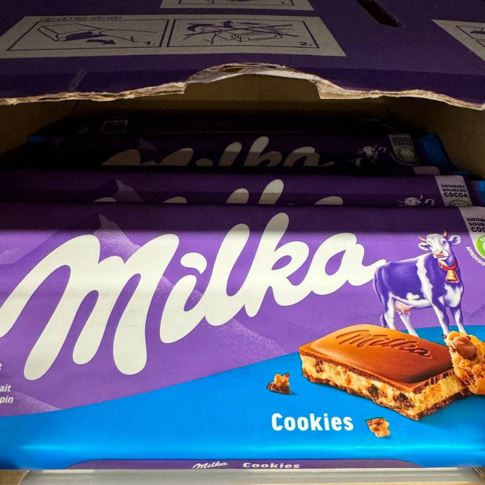 

Milka Chocolate with 100% Alpen Milk Cookies Import Coklat Cokelat Milka Rasa Kukis