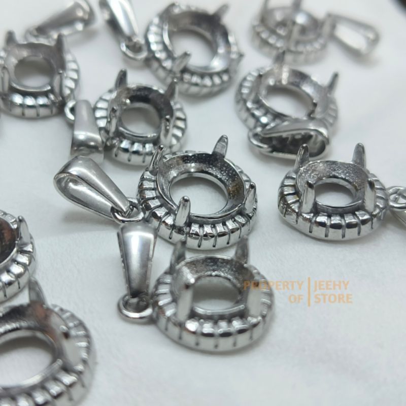 RING LIONTIN TITANIUM GIGI BULAT