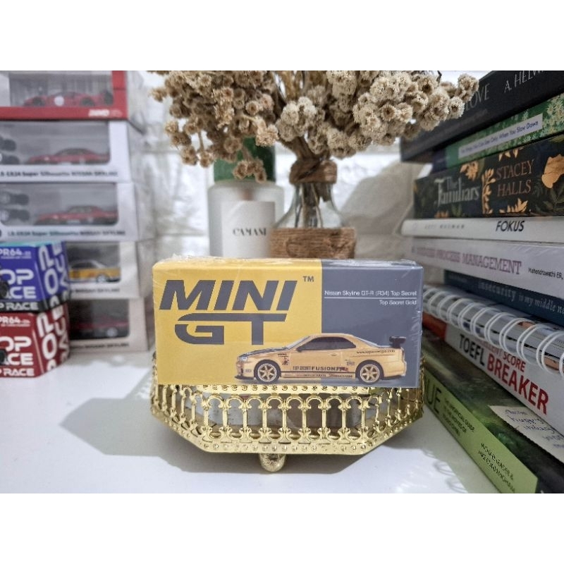 Mini GT Nissan Skyline Gt R R34 Gold