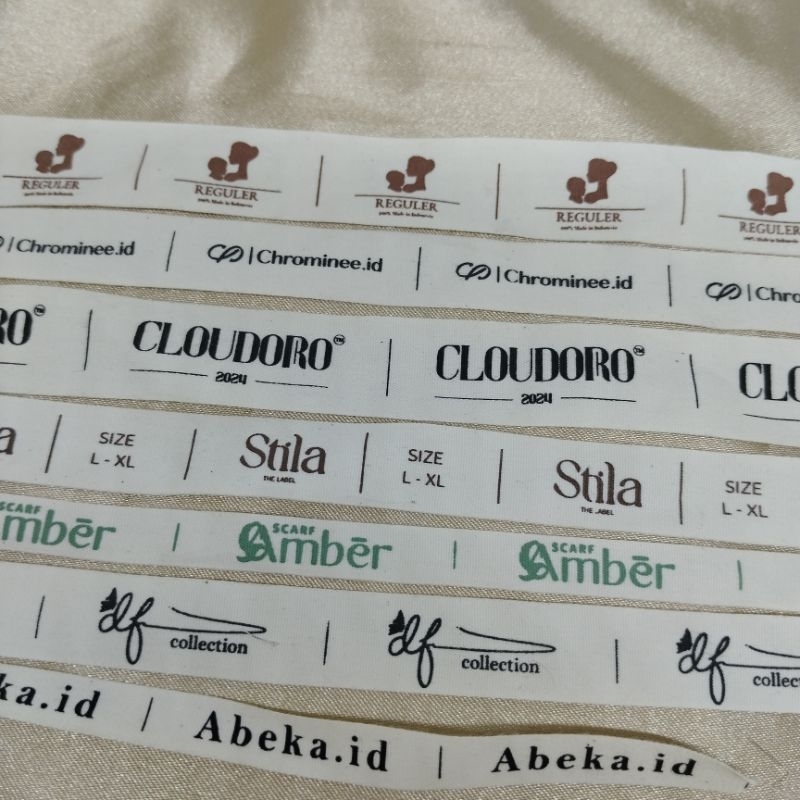 

100 pcs label custom free desain/ label hijab / piterban lembut /label baju / label hijab / label pakaian / label nama / katun import desain suka suka