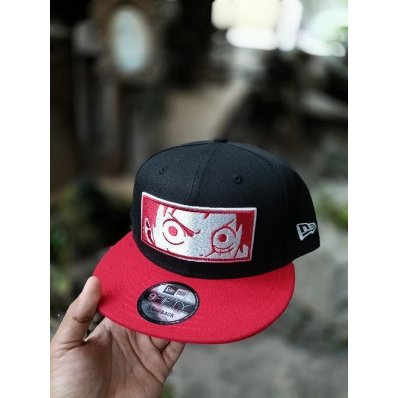 topi merk new era one piece