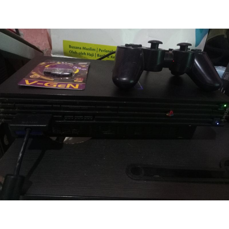 PS 2 fat seri 3 mc boot  /Matrix flashdisk 32gb full game tinggal main garansi aman