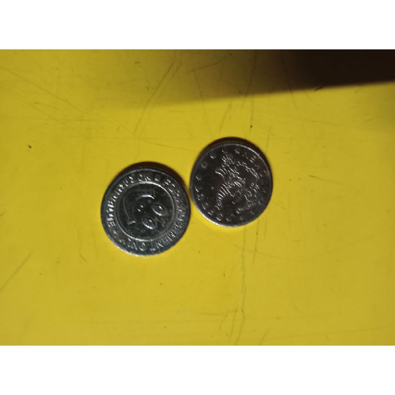 koin badut capit boneka