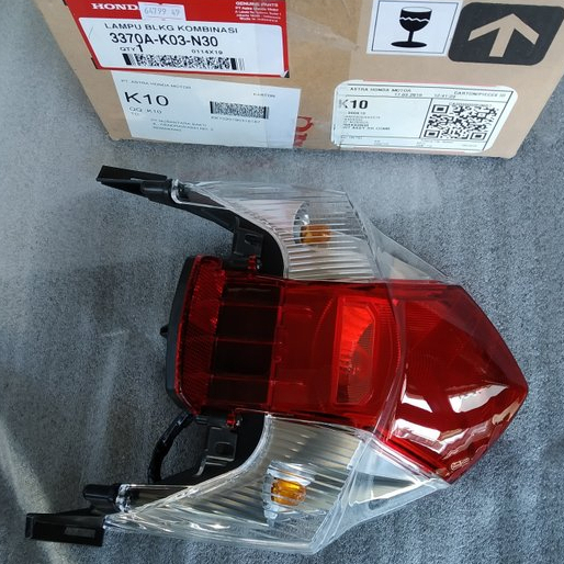 LAMPU BELAKANG REVO 110 F1 [3370A-K03-N30]