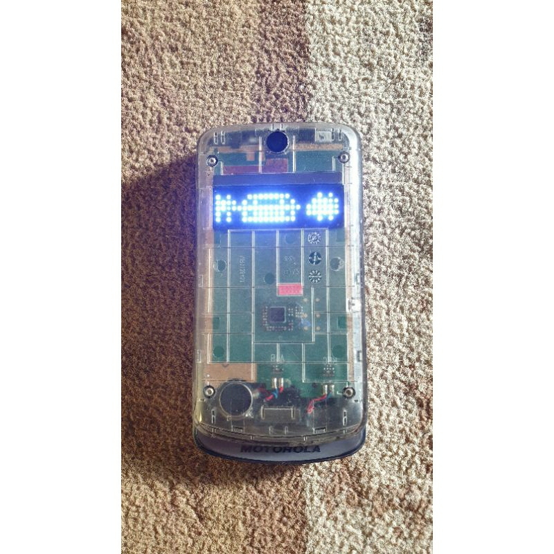 handphone jadul Motorola ex212 lipat transparan