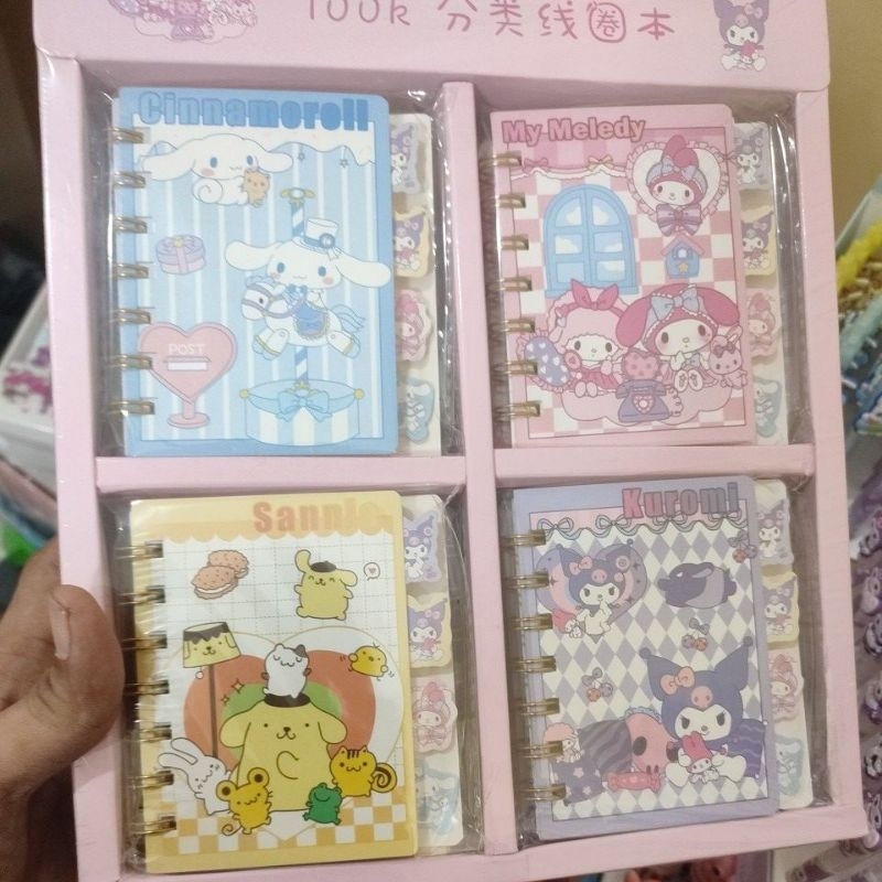 

1 box note book sanrio ringgold