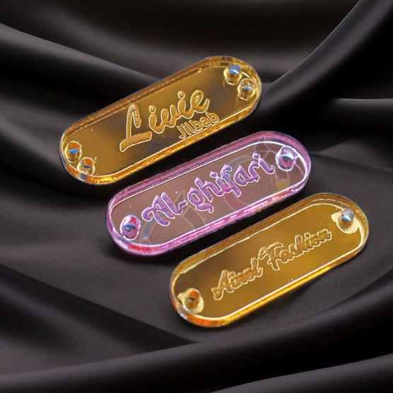 

label kaca/label acyrilic label hijab label gamis label pakaian label nama label brand