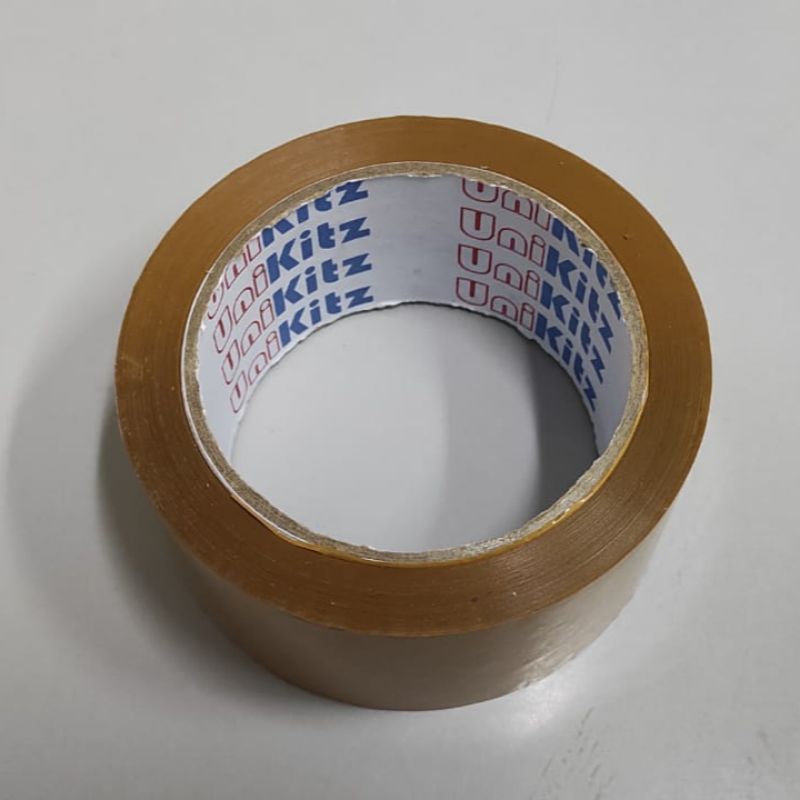 

JUAL LAKBAN COKLAT unikitz (per pcs/1roll) [48mmx90Y]