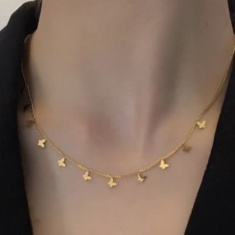 SK - kalung titanium kupu2 kecil gold anti karat