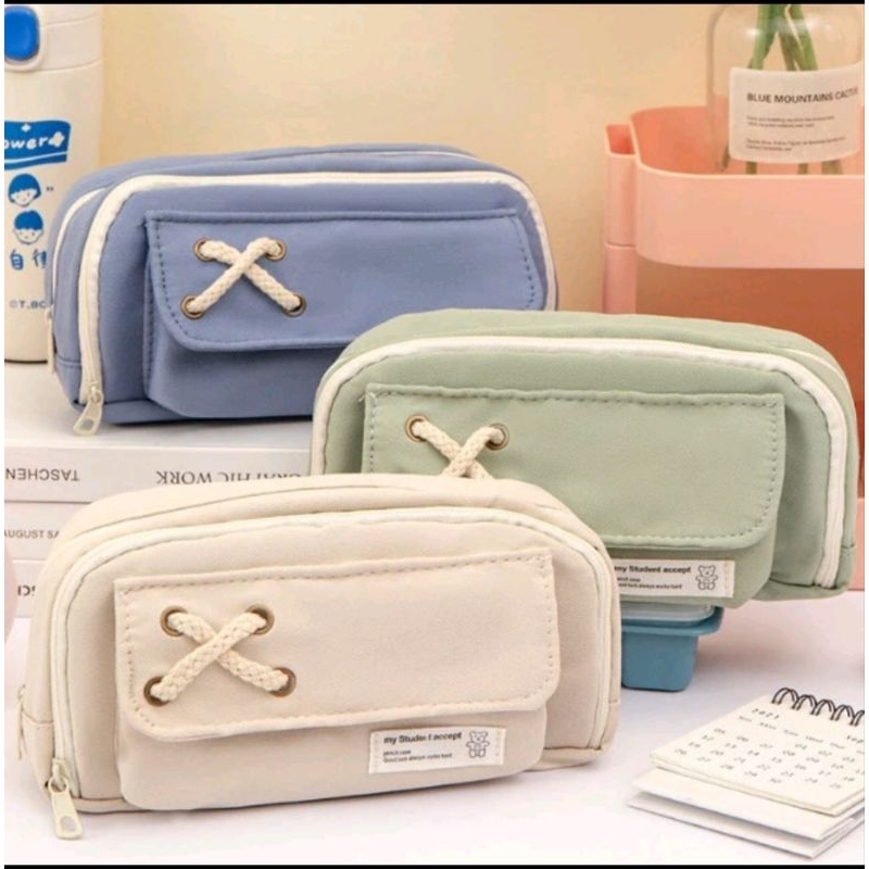 

Tempat Pensil Model Pita Silang Kotak Pensil Tali Rami Resleting Ganda Bahan Kanvas