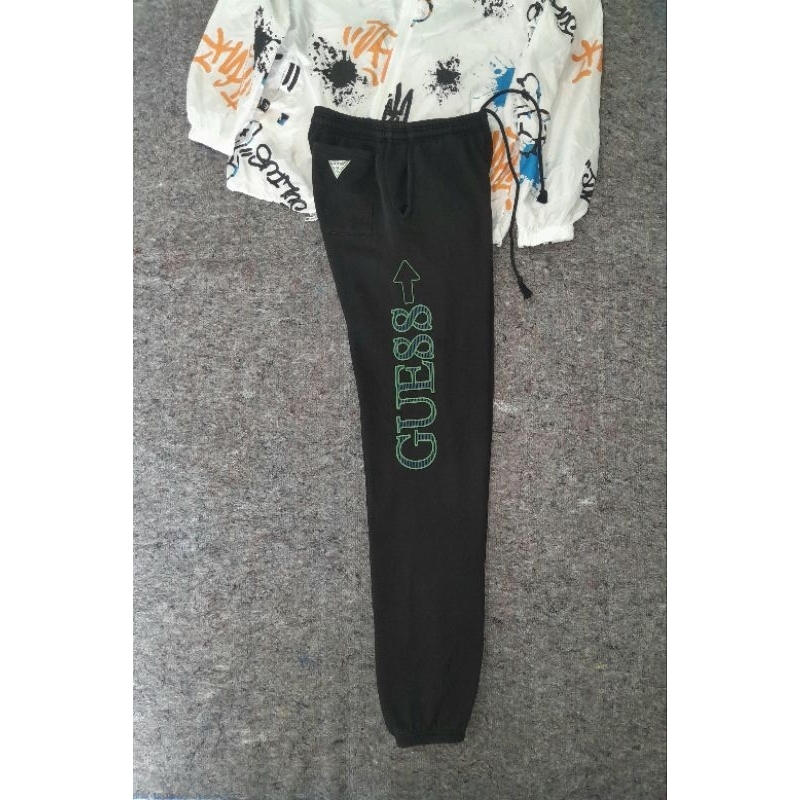 CELANA GUESS 88 RISING BLACK HEAD IN THE CLOUDS JOGER PANTS USA