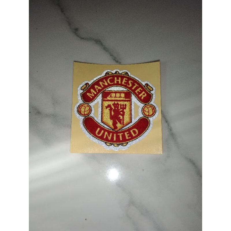 

stiker logo MU manchester united printcut reflektif motor helm kaca hp laptop